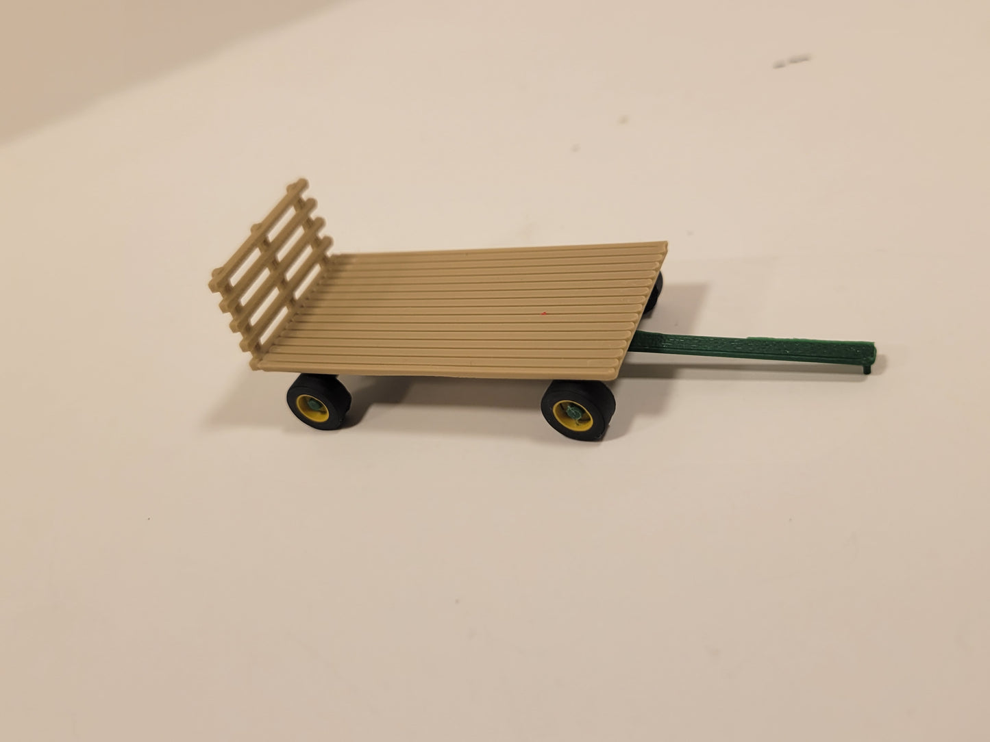 Hay wagon flat with green running gear 1/87