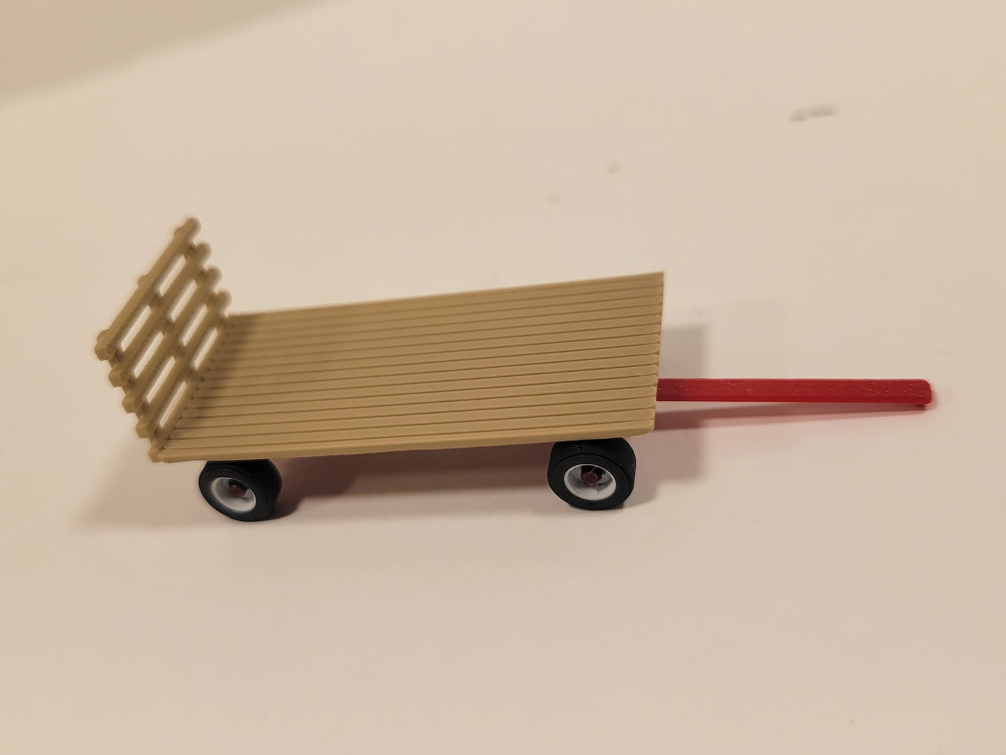 1/87 Flat hay wagon with red running gear assembled